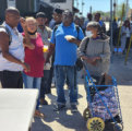 people giving foods to homeless and in need