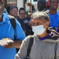 people giving foods to homeless and in need
