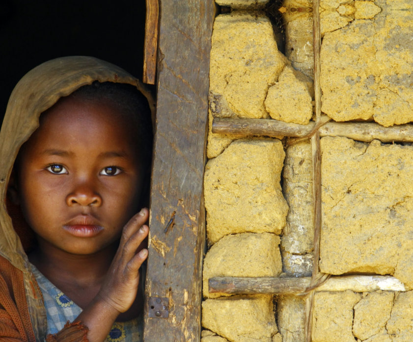 a child beside the wall