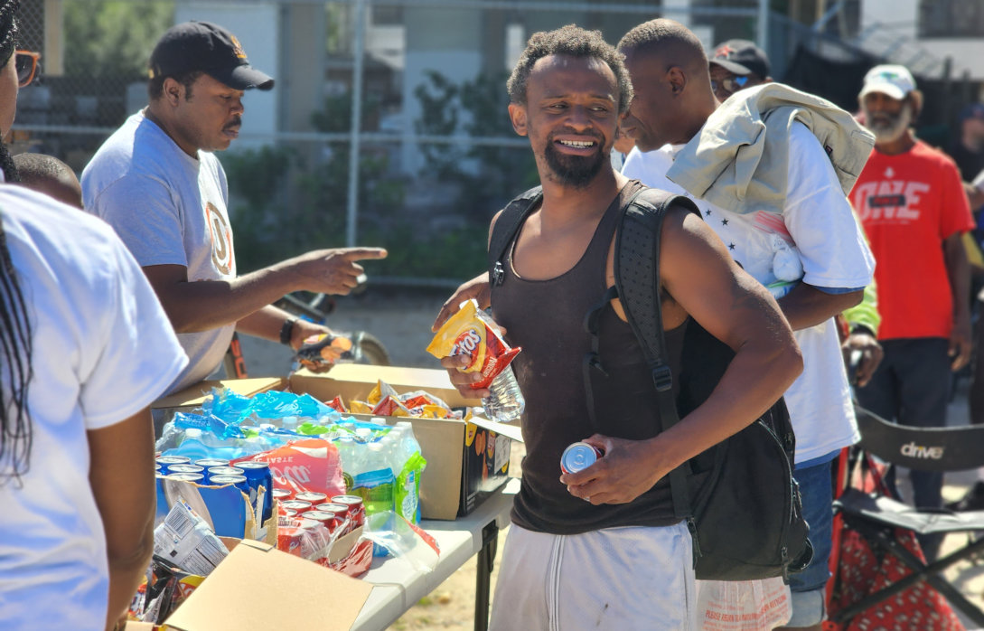 man with food from pantry
